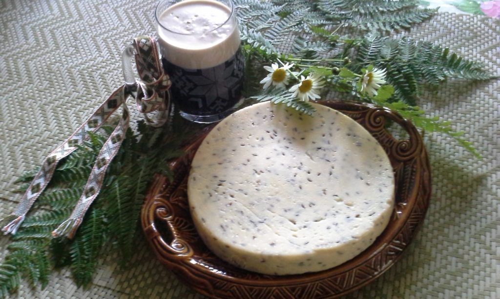 Traditional Jāņi cheese with beer.